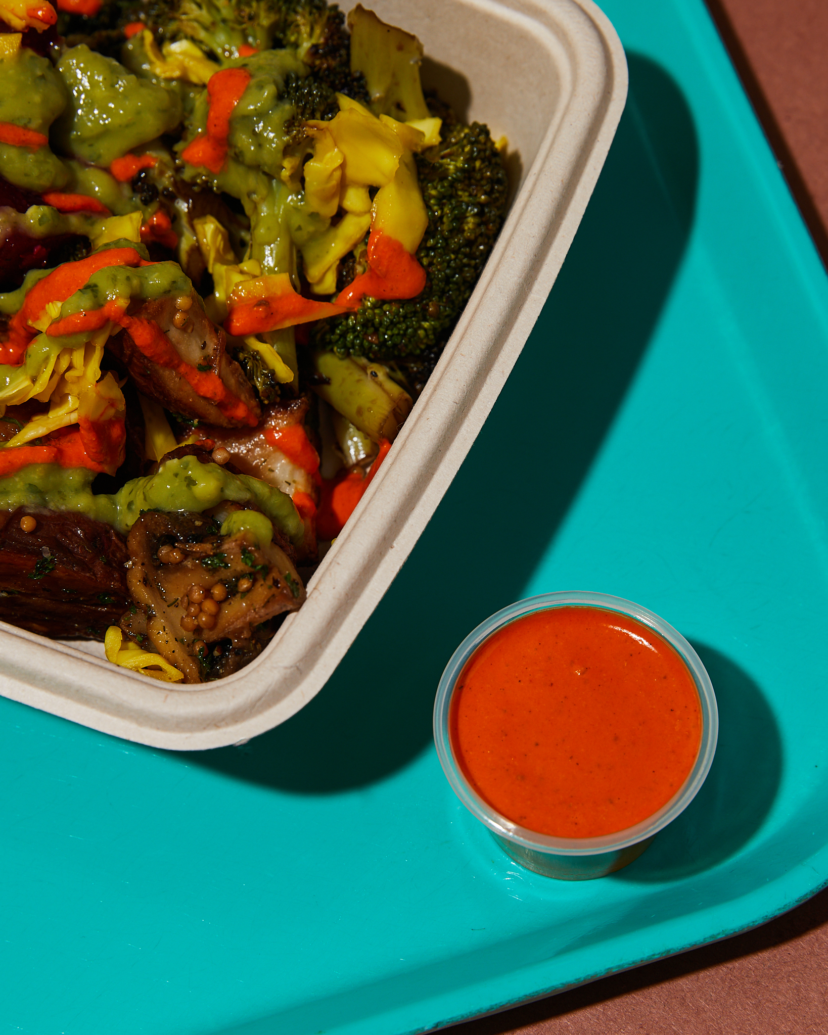 The image showcases a vibrant salad featuring fresh broccoli and other vegetables, perfect for a healthy lunch option. This aligns with Maepole's commitment to providing nutritious and delicious meals that cater to health-conscious diners.